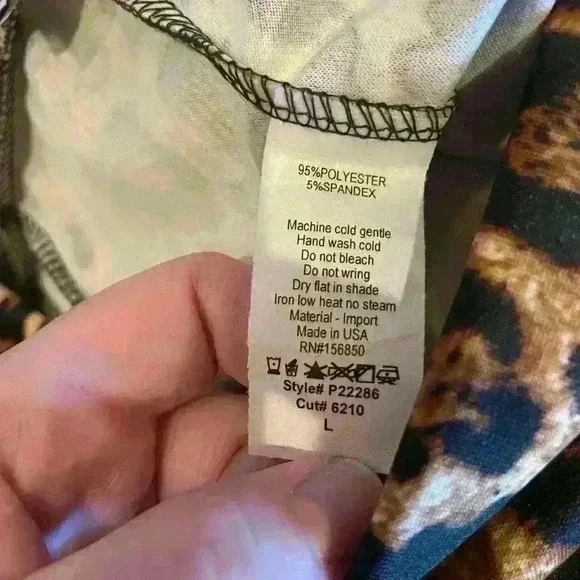 Perfectly Priscilla stretchy leopard flare pants. Size Large. New with tags! 🐆 - Picture 2 of 6